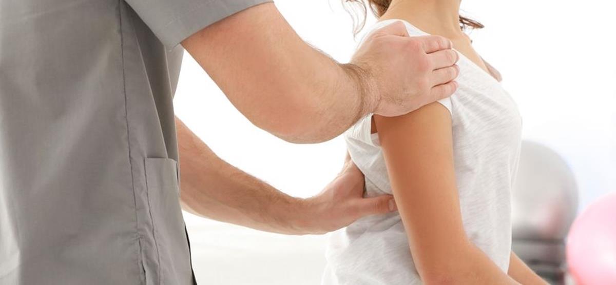 bigstock-Physiotherapist-working-with-p-168310400