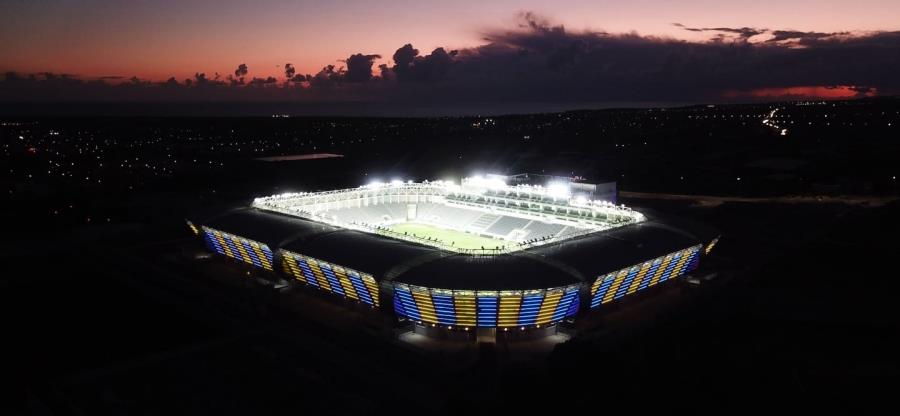 5249229805816802 Alphamega-Stadium-illuminated-in-yellow-and-blue