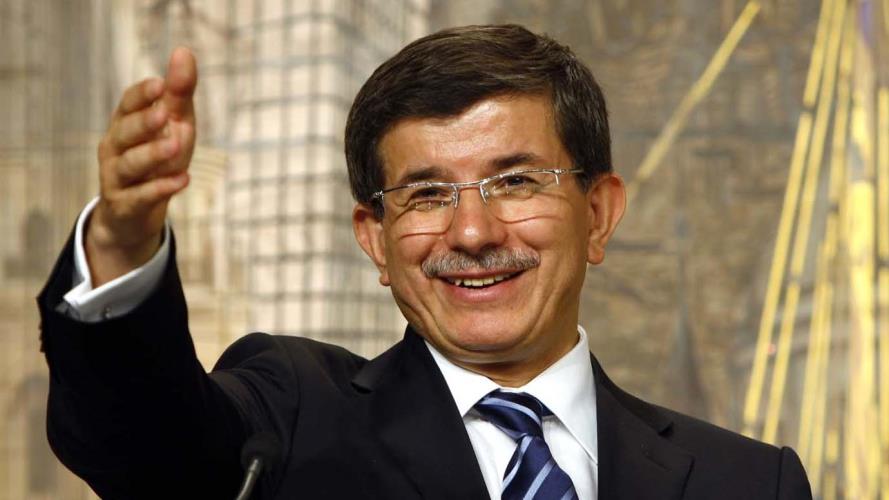 Turkey's Foreign Minister Davutoglu talks during a joint news conference with his Syrian counterpart Moualem in Istanbul