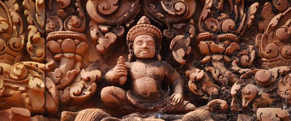 Carvings of Hindu God Indra riding on Airavata three-headed elephant at Banteay Srei temple.