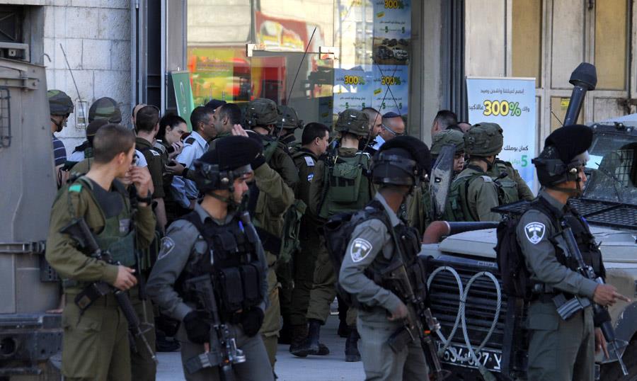 Two Palestinians shot after stabbing soldiers