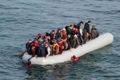 Refugees and migrants arrive on the Greek island of Lesbos