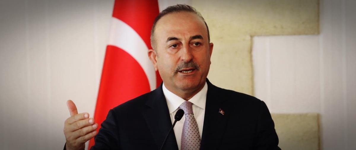 Turkey's Foreign Minister Mevlut Cavusoglu talks at a press conference during a visit in the Turkish Cypriot northern part of the divided city of Nicosia