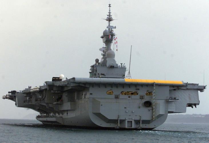 French nuclear navy aircraft carrier Charles de Gaulle sails off Brest dockyard where it was built 30 September 2000 to reach its new harbor Toulon. The 1250-crew members ship is expected to arrive 03 October.
 AFP PHOTO VALERY HAHE