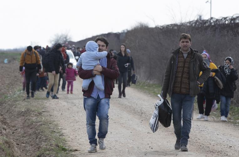 Refugees try to reach Europe from Erdine, Syria