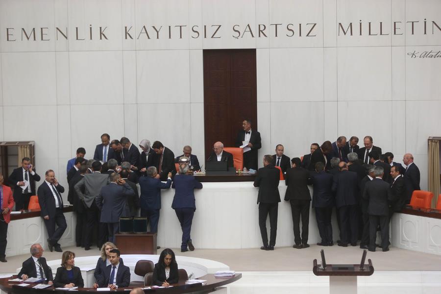 Turkish lawmakers vote on a bill lifting immunity