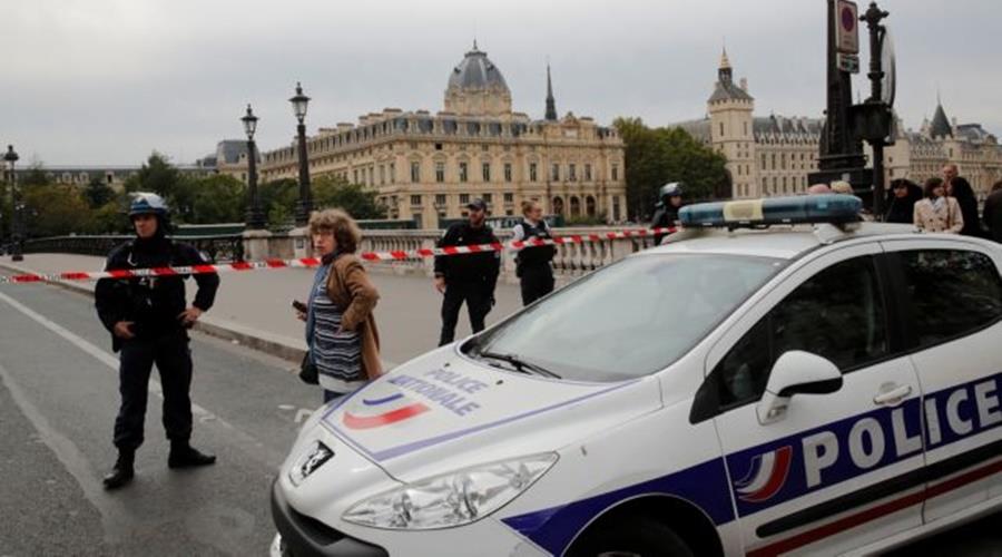 French police secure the area in front of the Paris Police headquarters in Paris
