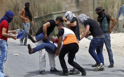 Palestinian protesters clash with Israeli security forces