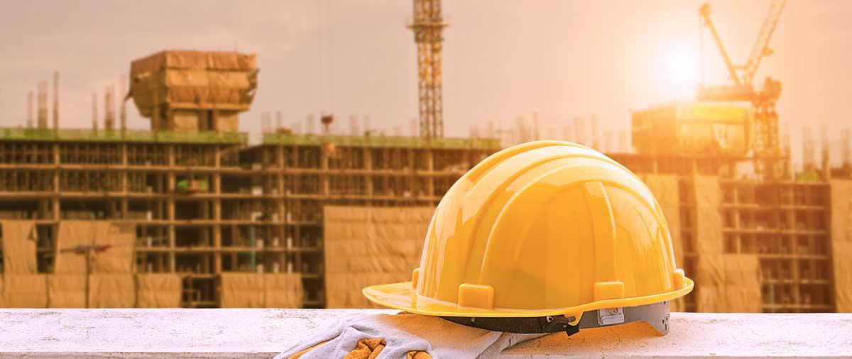 yellow hard hat on construction site