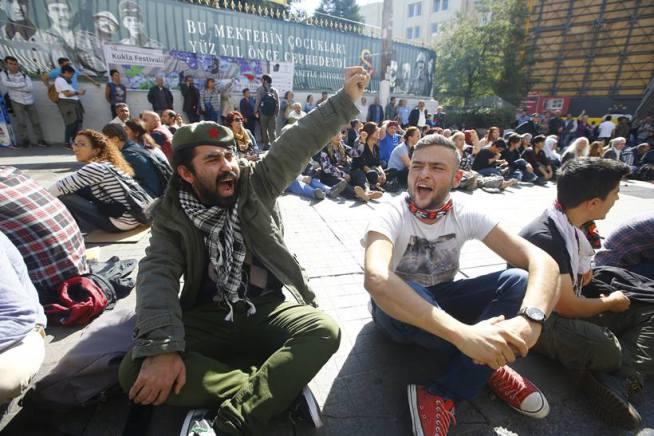 Demonstrators attend a protest against explosions during a peace march in Ankara, in central Istanbul,
