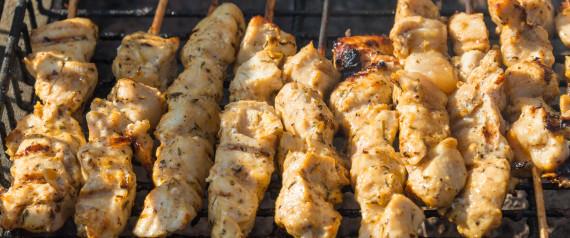 TORONTO, ONTARIO, CANADA - 2015/06/20: Meat cooking at the Taste of Little Italy Festival.  Chicken and pork souvlaki (a Greek form of kebabs) sit on a grill. (Photo by Roberto Machado Noa/LightRocket via Getty Images)