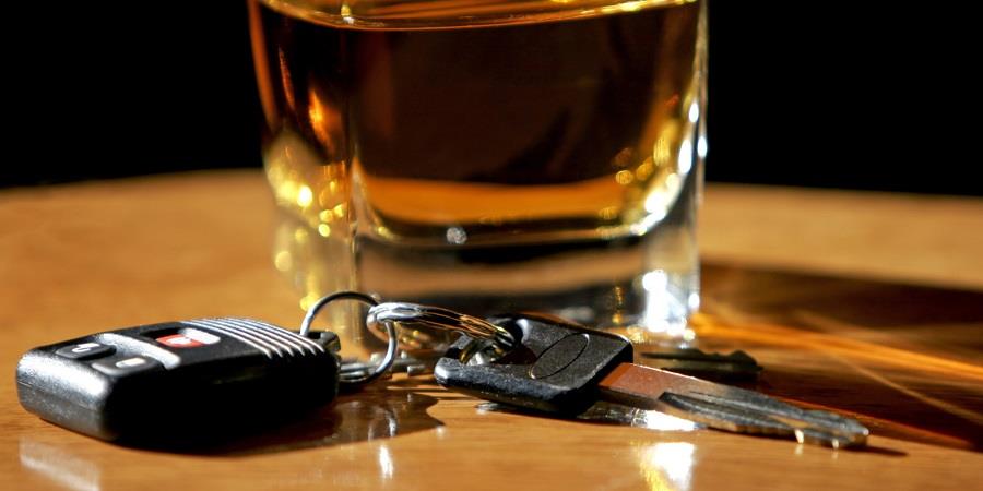 Drinking and Driving - Car keys and alcohol (shallow focus).; Shutterstock ID 600683; PO: aol; Job: production; Client: drone