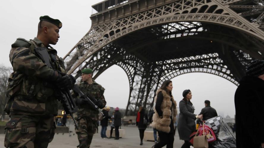 French soldiers patrol near the Eiffel Tower in Paris as part of the highest level of "Vigipirate" security plan after a shooting at the Paris offices of Charlie Hebdo
